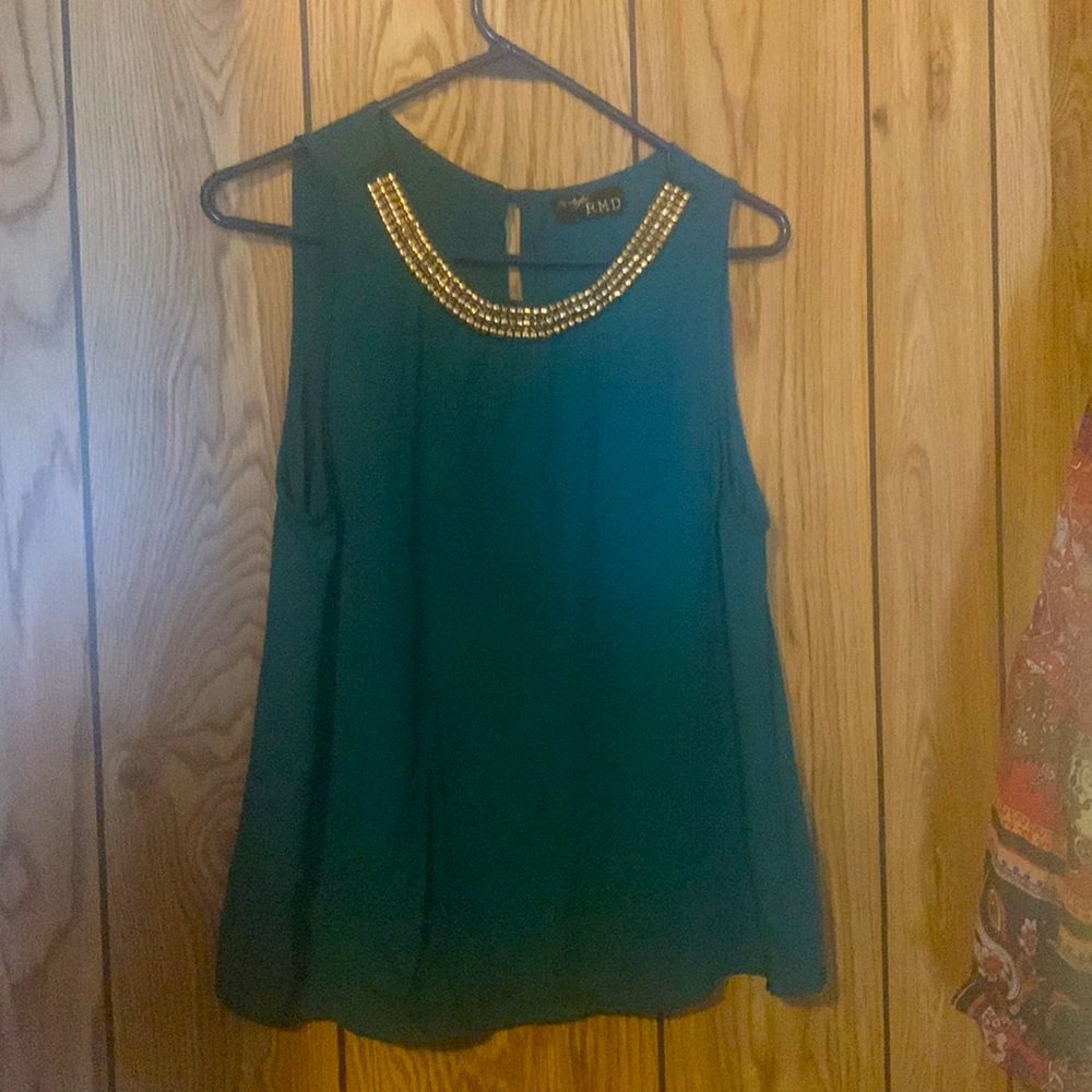 Los Angeles RMD blouse green with gold at neckline.